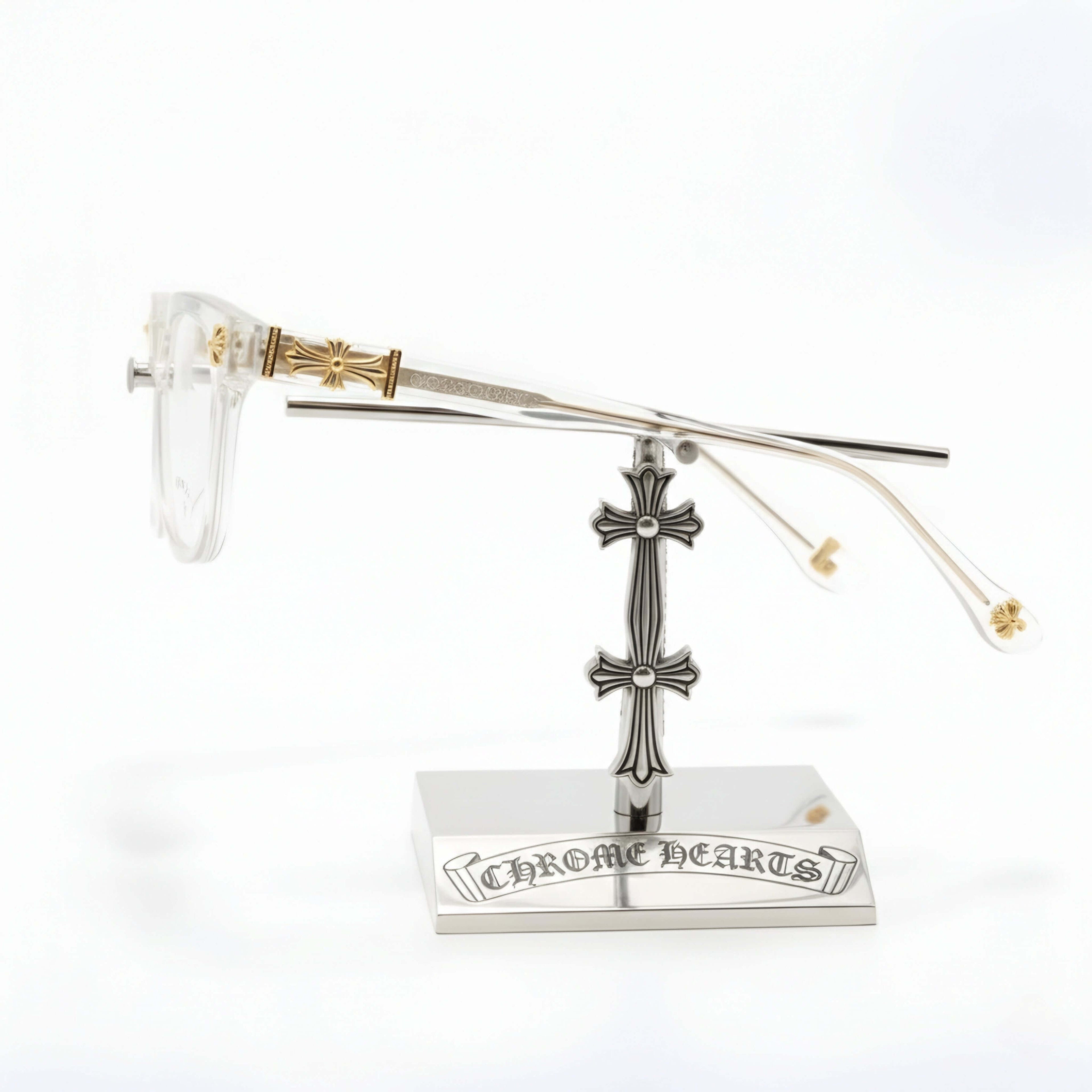 Crystal Gilded Square glasses showcasing icy transparency and vintage gold accents on a sleek stand.