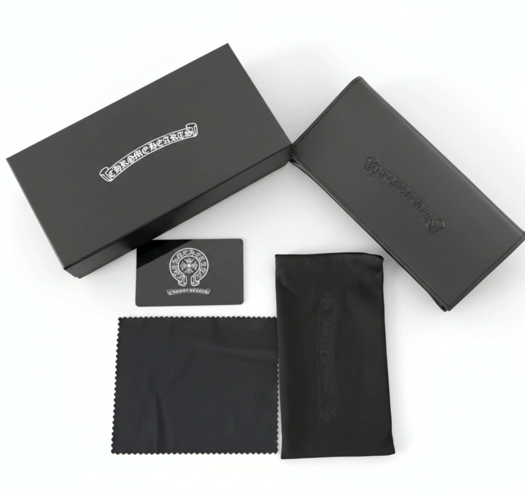 Collector’s Box Set including a protective case, cleaning cloth, and warranty card on a white background.