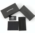 Collector’s Box Set including a protective case, cleaning cloth, and warranty card on a white background.